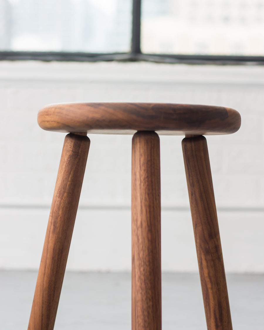 Wooden stool with a blurred background