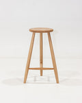 Wooden bar stool on a white background